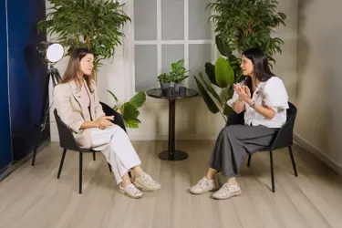 Psychologist Rama Kanj answering parenting questions during a discussion with a mother