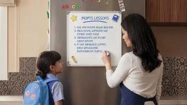 Mom teaching her daughter important life lessons before she heads to school