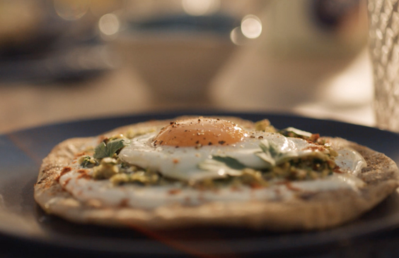 Fried Egg on Pita Bread with Green Olive Paste and Cream Cheese Spread