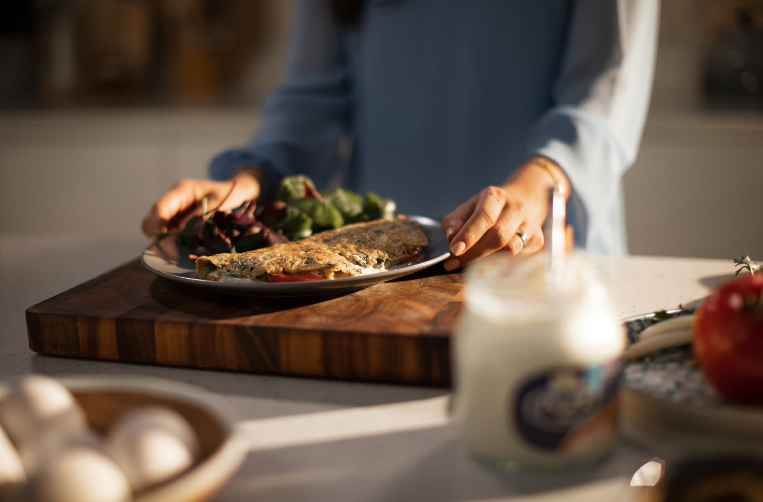 Fresh Herb Omelette with Tomato Slices and Cream Cheese Spread