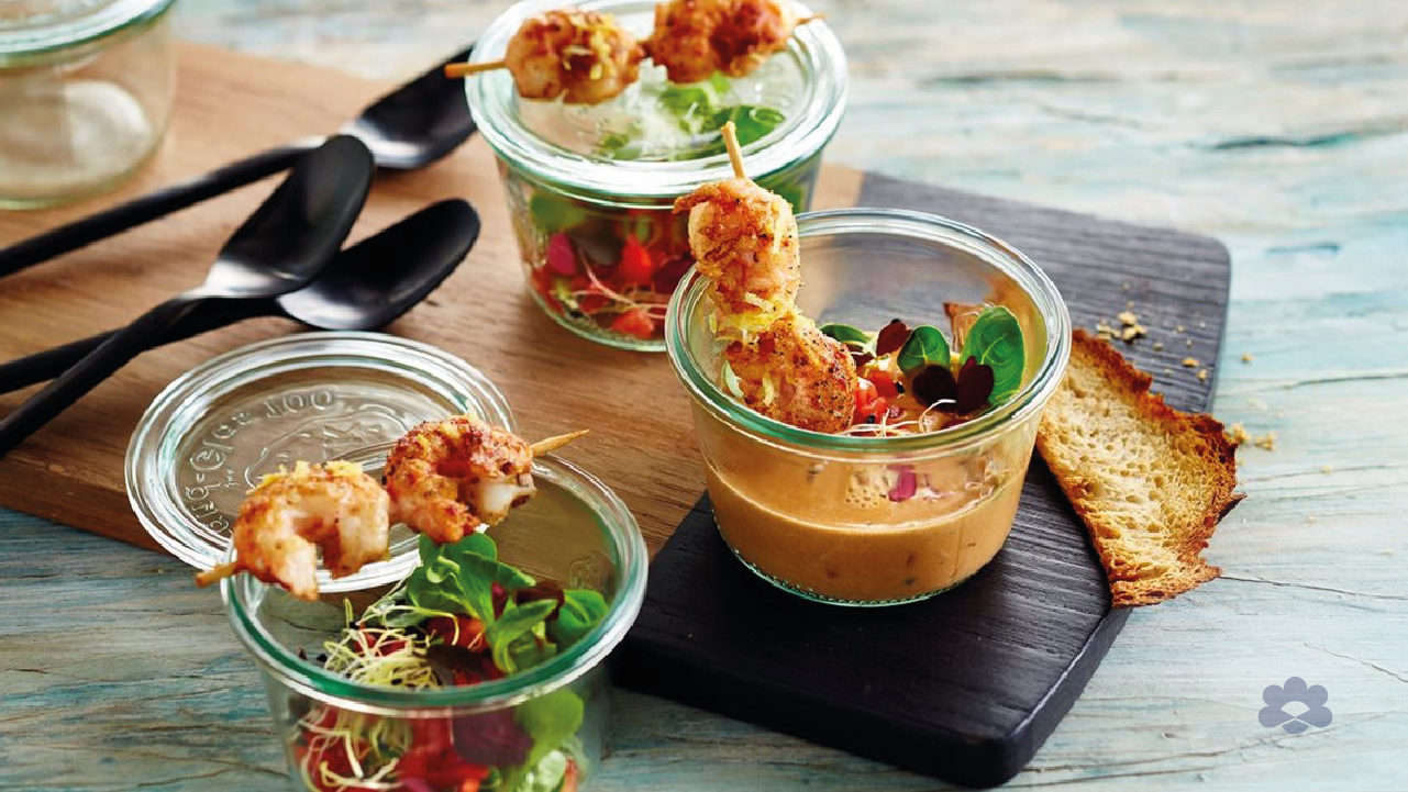 Seafood Soup with shrimp skewers