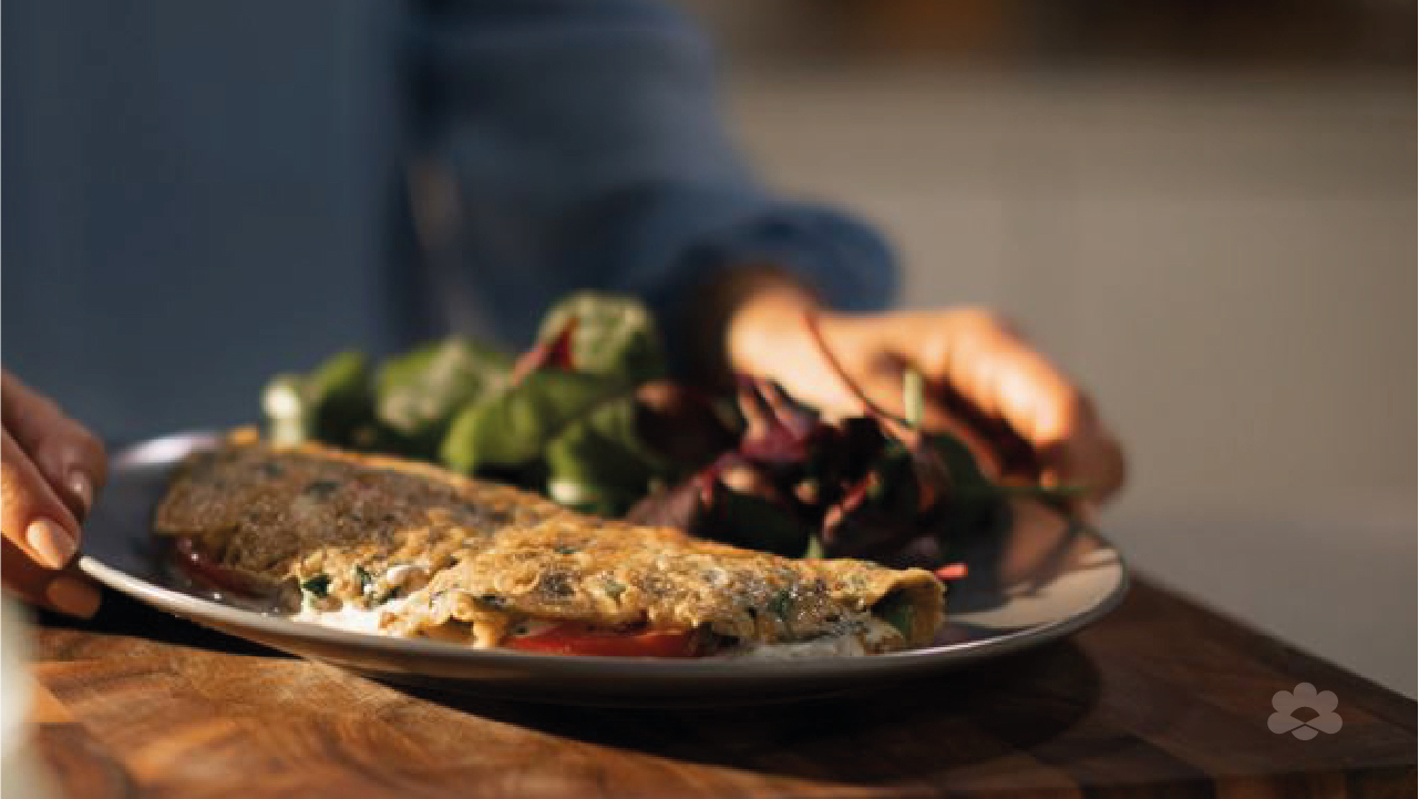 Fresh Herb Omelette with Tomato Slices and Cream Cheese Spread